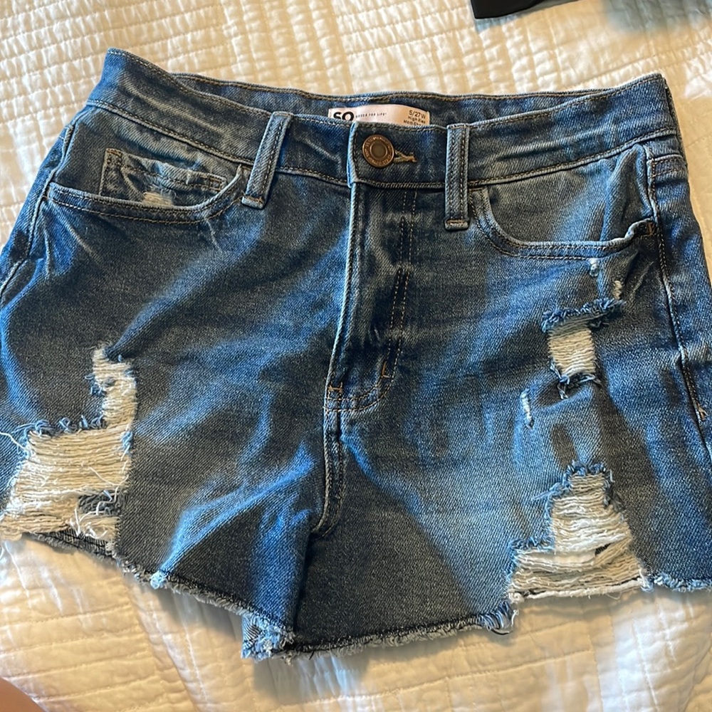 Blue ripped jean shorts
